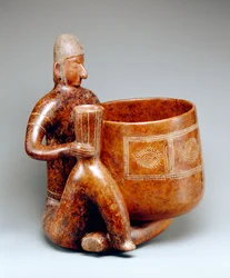 Hombre sentado (barro)